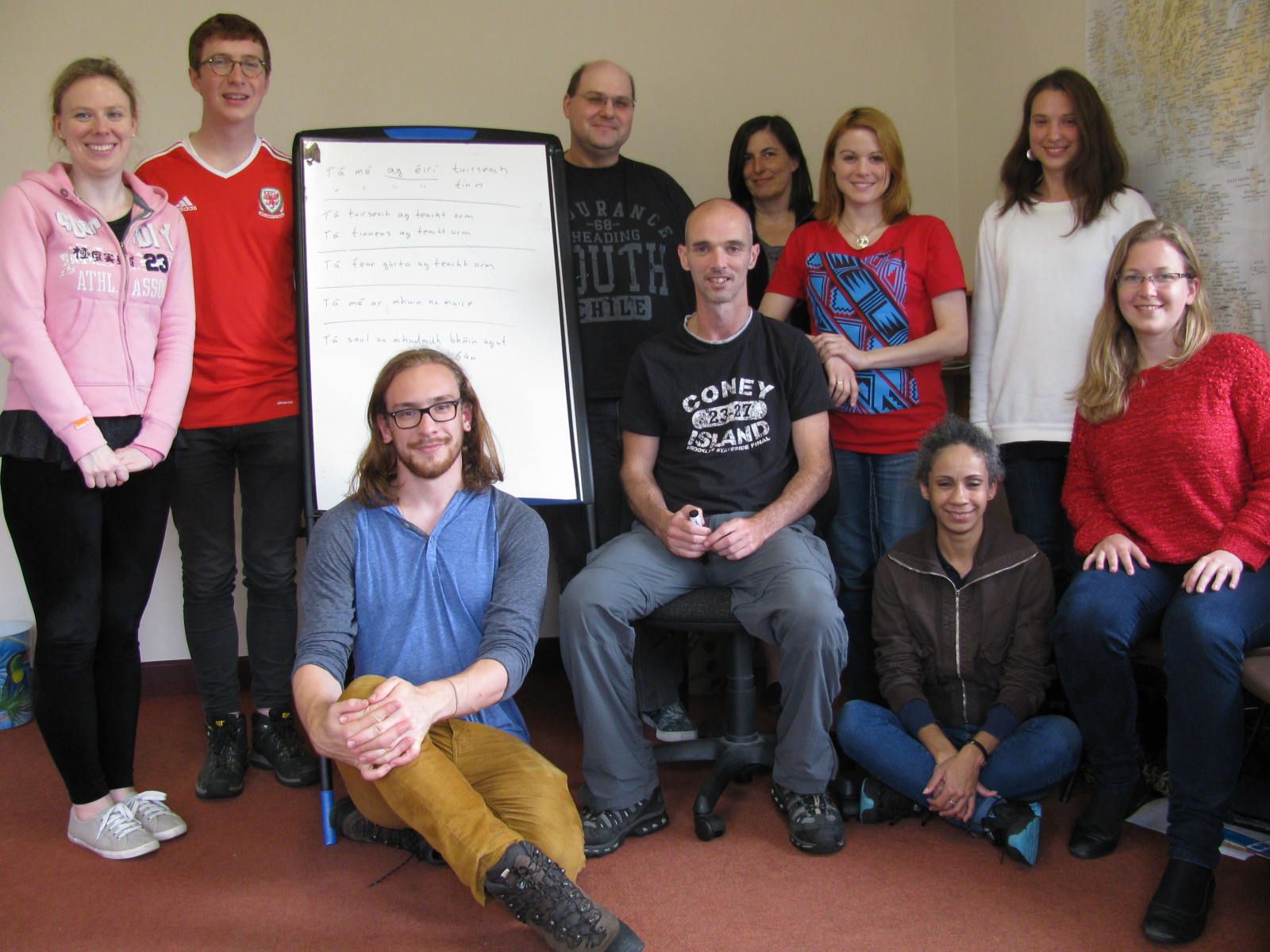 Irish language learners with teacher Andrew in an Oideas Gael classroom