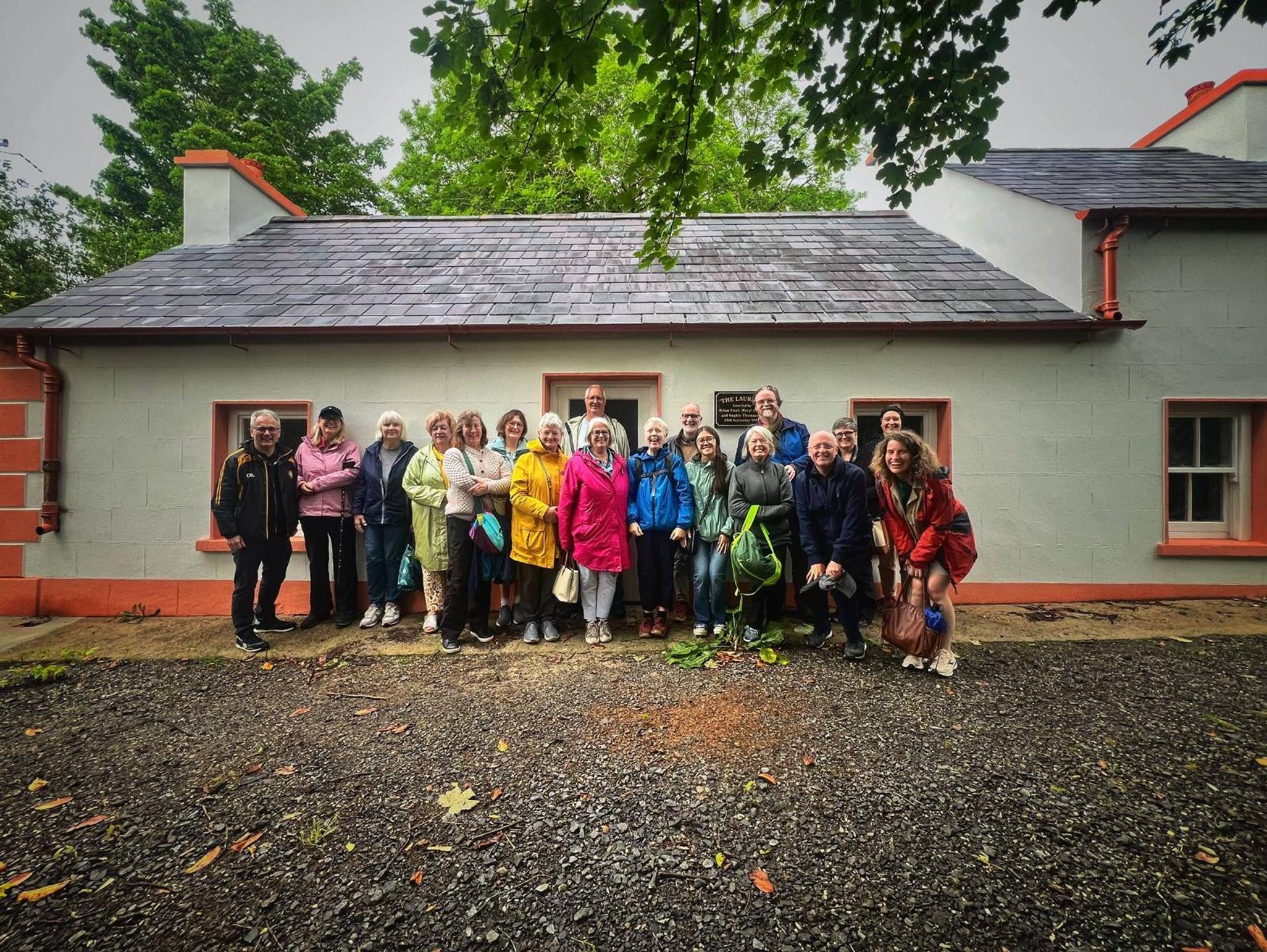 Oideas Gael course participants outside The Laurels, the house where Brian Friel was raised