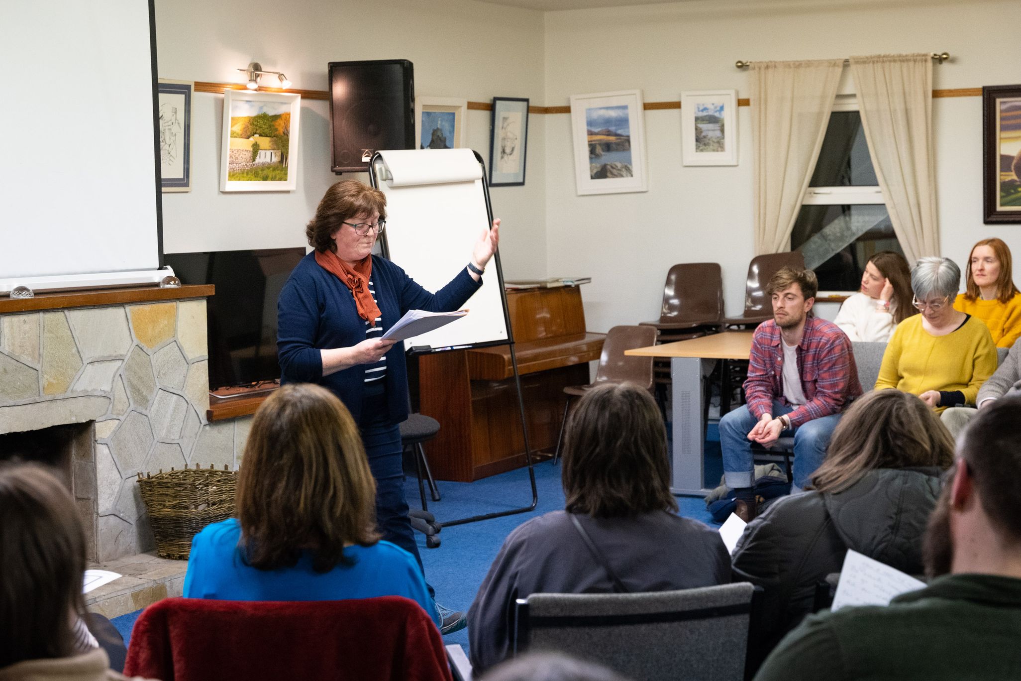 Colette McDevitt leads the class in singing